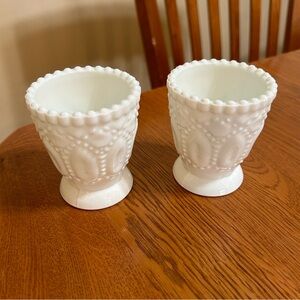 Two vintage milk glass candle holders